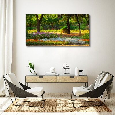 Obraz Canvas Kwiatowy raj w słonecznym ogrodzie