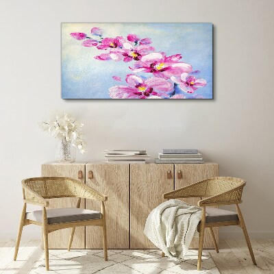 Obraz na Płótnie Różowe orchidee na niebieskim tle