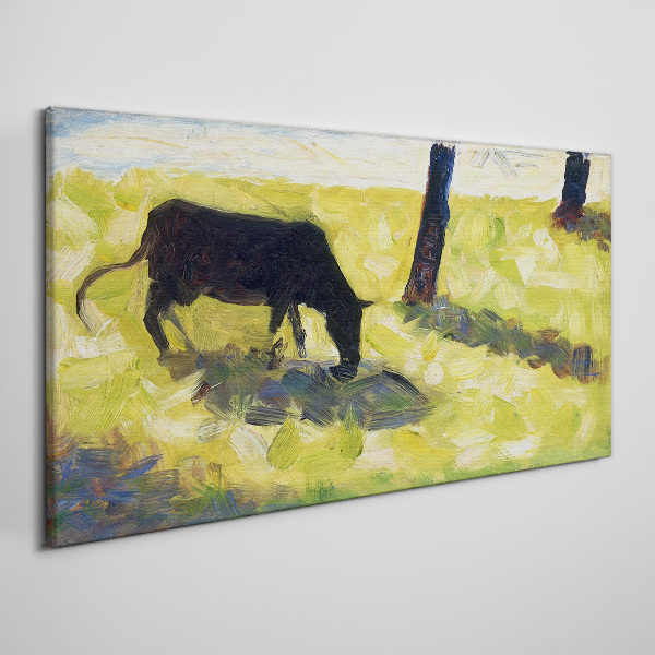 Obraz Canvas Pasąca się krowa w zielonym krajobrazie