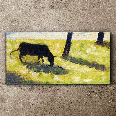 Obraz Canvas Pasąca się krowa w zielonym krajobrazie