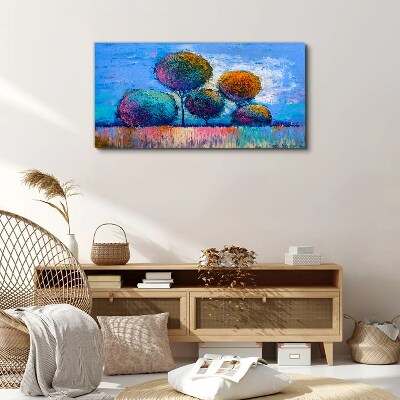 Obraz Canvas Kolorowe drzewa na niebieskim tle