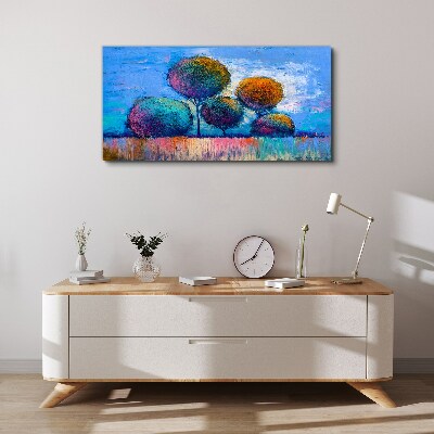 Obraz Canvas Kolorowe drzewa na niebieskim tle