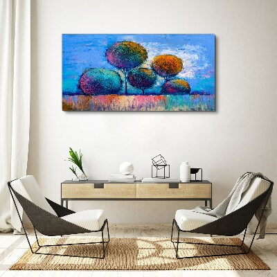 Obraz Canvas Kolorowe drzewa na niebieskim tle