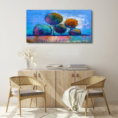 Obraz Canvas Kolorowe drzewa na niebieskim tle