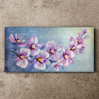 Obraz Canvas Kwiatowe orchidee na niebieskim tle