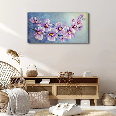 Obraz Canvas Kwiatowe orchidee na niebieskim tle