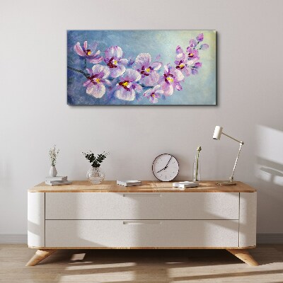 Obraz Canvas Kwiatowe orchidee na niebieskim tle