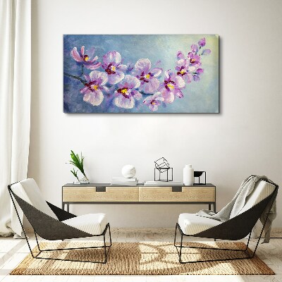 Obraz Canvas Kwiatowe orchidee na niebieskim tle