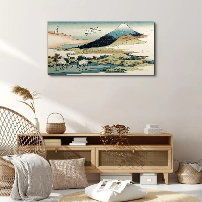 Obraz Canvas Cranes by a Mountain