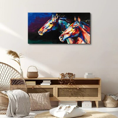 Obraz Canvas Kolorowe konie w ruchu