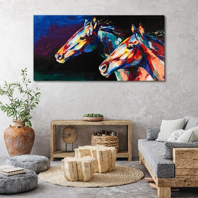 Obraz Canvas Kolorowe konie w ruchu