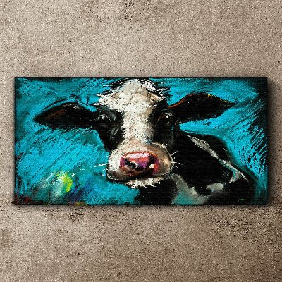 Obraz Canvas Portret krowy na niebieskim tle