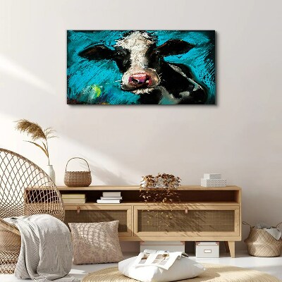 Obraz Canvas Portret krowy na niebieskim tle