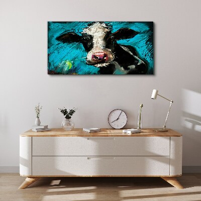 Obraz Canvas Portret krowy na niebieskim tle