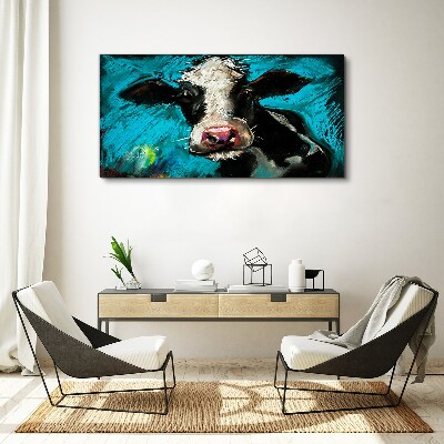 Obraz Canvas Portret krowy na niebieskim tle