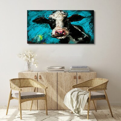 Obraz Canvas Portret krowy na niebieskim tle