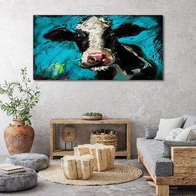 Obraz Canvas Portret krowy na niebieskim tle