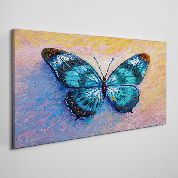 Obraz Canvas Błękitny motyl na pastelowym tle