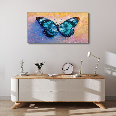 Obraz Canvas Błękitny motyl na pastelowym tle