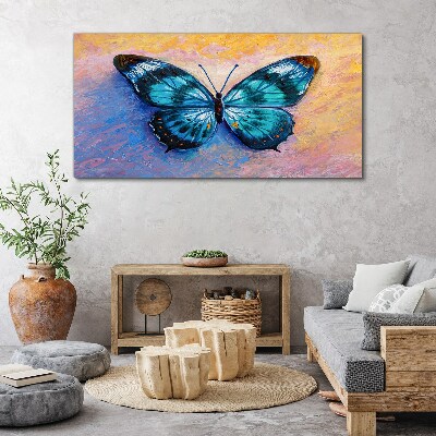 Obraz Canvas Błękitny motyl na pastelowym tle