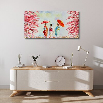 Obraz Canvas Wiosenny spacer pod kwitnącymi drzewami