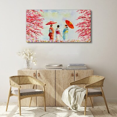 Obraz Canvas Wiosenny spacer pod kwitnącymi drzewami