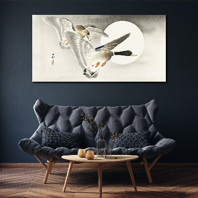 Obraz Canvas Lot dzikich kaczek w blasku księżyca