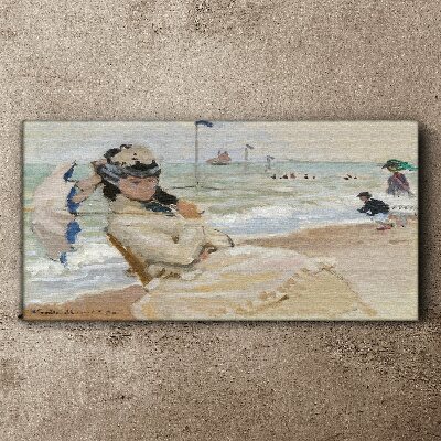 Obraz na Płótnie Kobieta na plaży z parasolką
