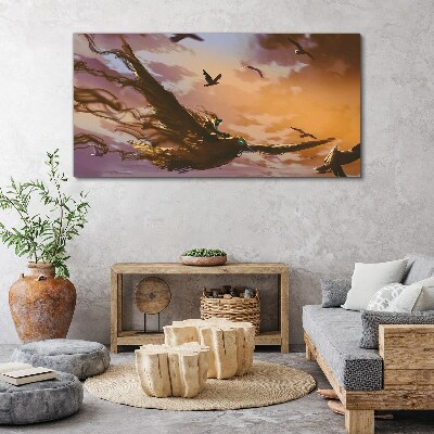 Obraz Canvas Lot ptaków w zachodzącym słońcu