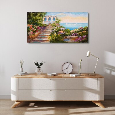 Obraz Canvas Spacer wśród kwiatów nad morzem