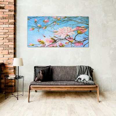 Obraz Szklany Kwiaty magnolii na błękitnym tle