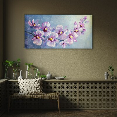 Obraz Szklany Kwiatowe orchidee na niebieskim tle