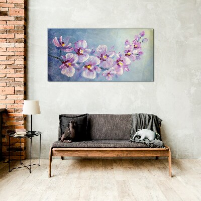 Obraz Szklany Kwiatowe orchidee na niebieskim tle