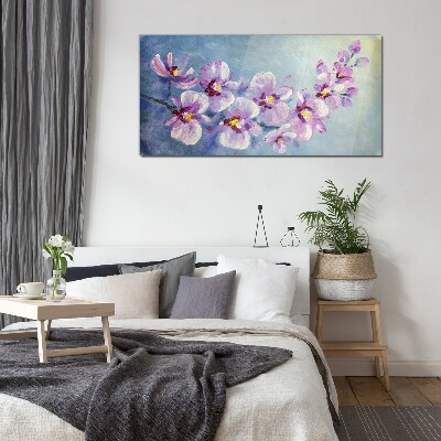 Obraz Szklany Kwiatowe orchidee na niebieskim tle