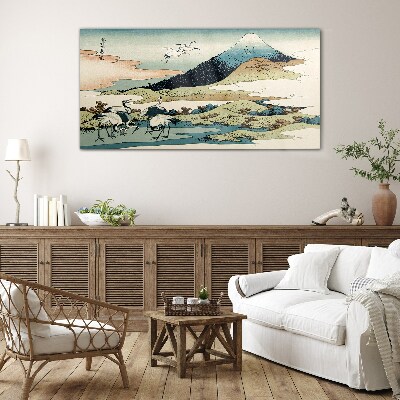Obraz Szklany Cranes by a Mountain