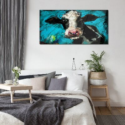Obraz Szklany Portret krowy na niebieskim tle